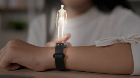 Close up of Female hand with futuristic smartwatch.