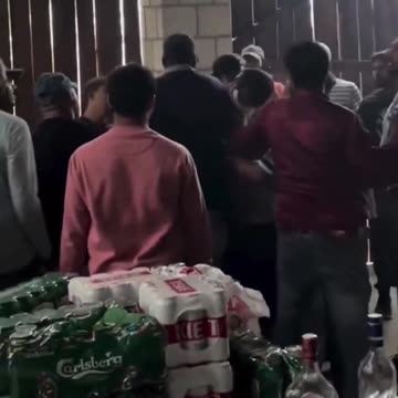 Fake asylum seekers celebrate invasion of Poland from Belarus in a Polish barn.