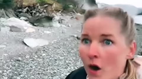 Woman escapes path of rockslide
