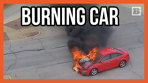 Firemen Respond to Car Erupting in Flames in Middle of Intersection