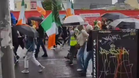 Enormous crowd marching through Cork, Ireland.