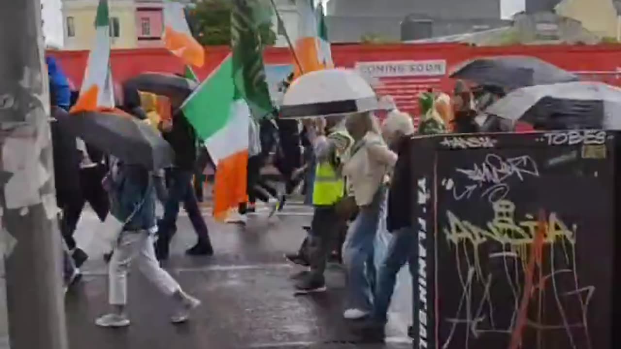 Enormous crowd marching through Cork, Ireland.
