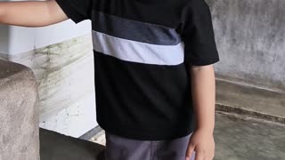 Grey with his toy car