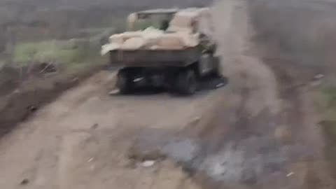 Russian Transport Running a Gauntlet of Destroyed Vehicles, Craters, and Attack Drones
