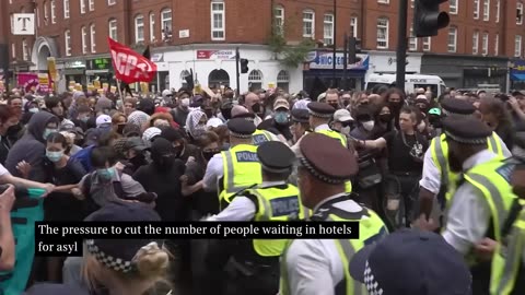 Protesters And Police Clash Outside Thistle City Barbican Hotel