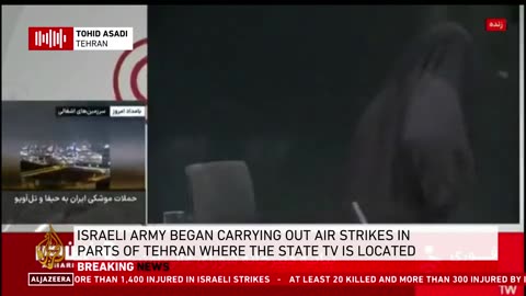Iranian state TV attacked while on air in latest wave of Israeli strikes on Tehran
