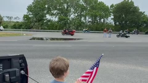 Patriotic Youngster Waves Flag as Motorcycles Escort Vietnam Memorial Wall | Space Coast 2025