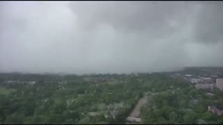 Video of the large tornado north of St. Louis, Missouri a short time ago; initial reports of damage.