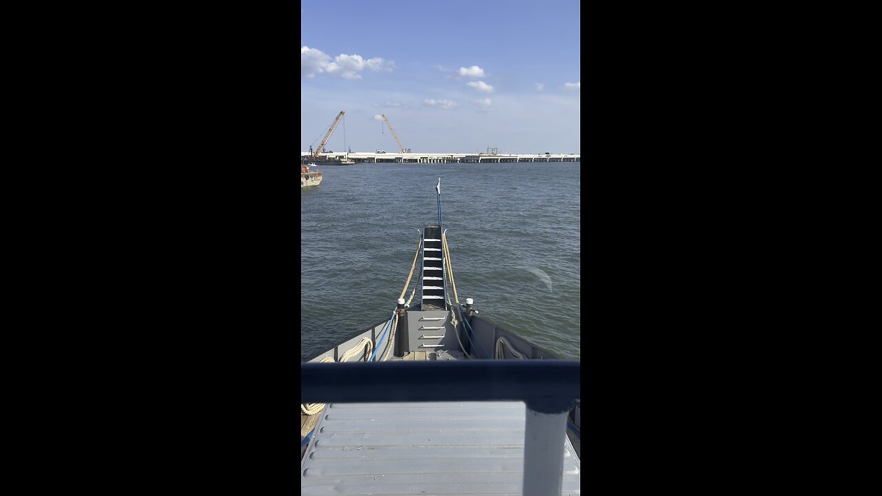 Tug boat making up to barge