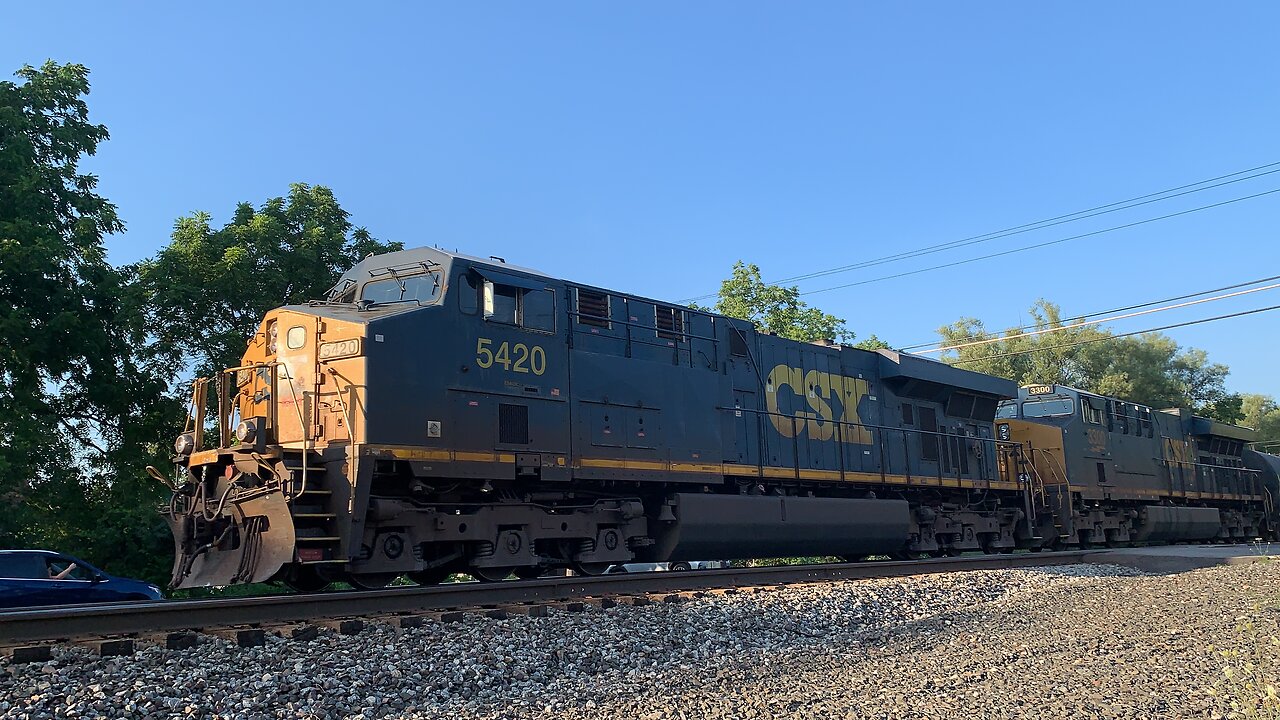 CSX Trains 5420 and 3300 head West