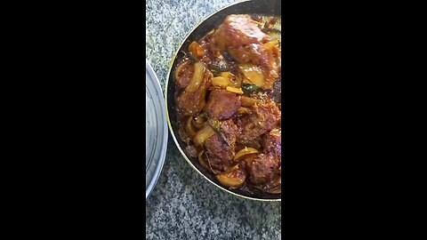 rohu fish coking with sauce and like it eat red rice