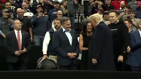 Crowd chants USA as President Trump shows up at NCAA wrestling championships