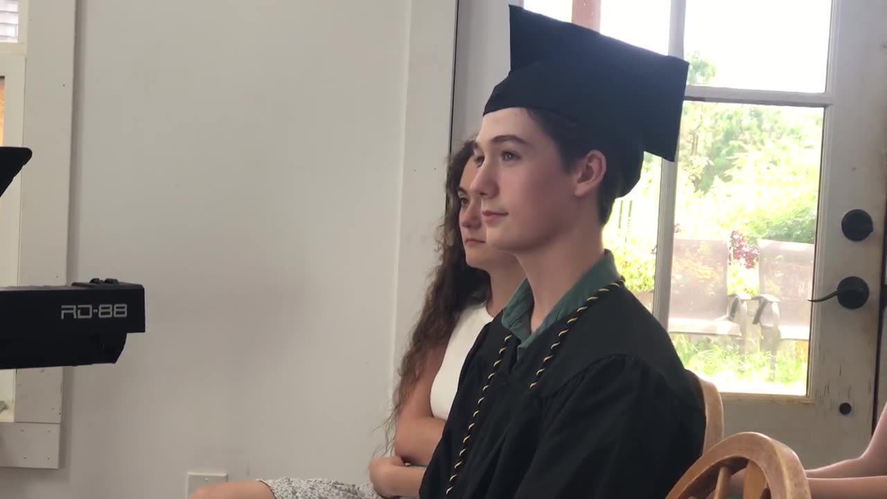 Izak graduates with Honors!