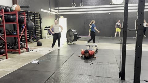 Passion WOD 100 DUs, 800m Barbell Carry 95lbs, 100 Burpees