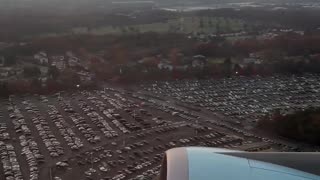 Air Force One flies over Northwest Stadium
