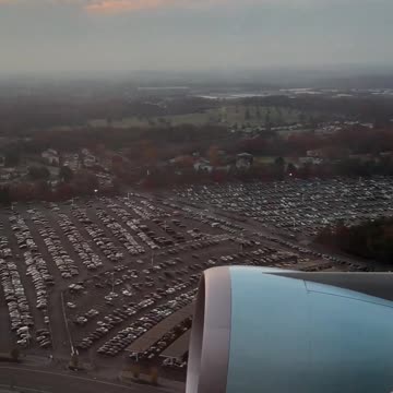 Air Force One flies over Northwest Stadium