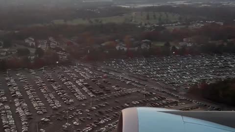 Air Force One flies over Northwest Stadium