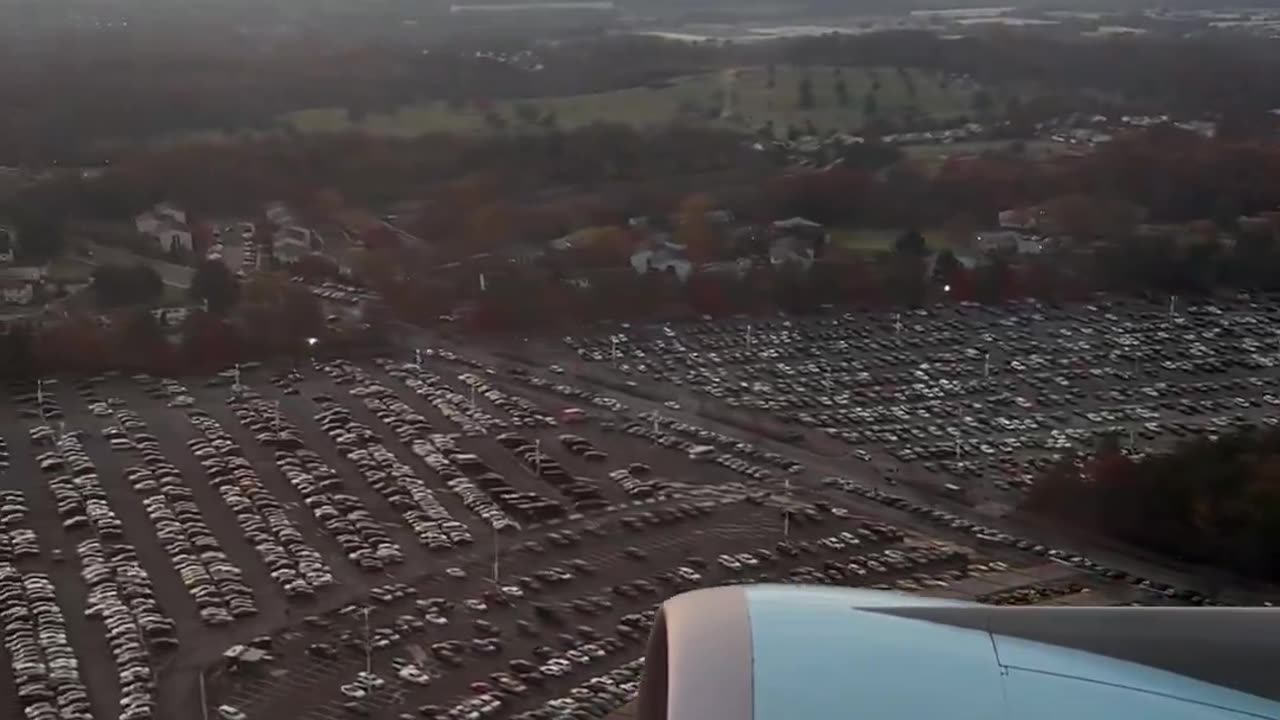 Air Force One flies over Northwest Stadium