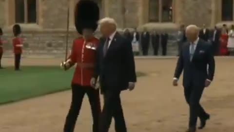 Trump breaks protocol - left the King Of England to follow behind him!