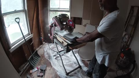 James doing tile in the Great gazoo_s bathroom,- SHEA SHOW