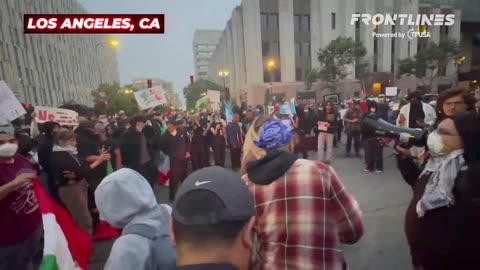 HAPPENING NOW_ Anti-ICE protesters burn an America