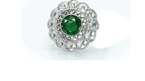 3 custom made emerald and diamond flower halo engagement rings
