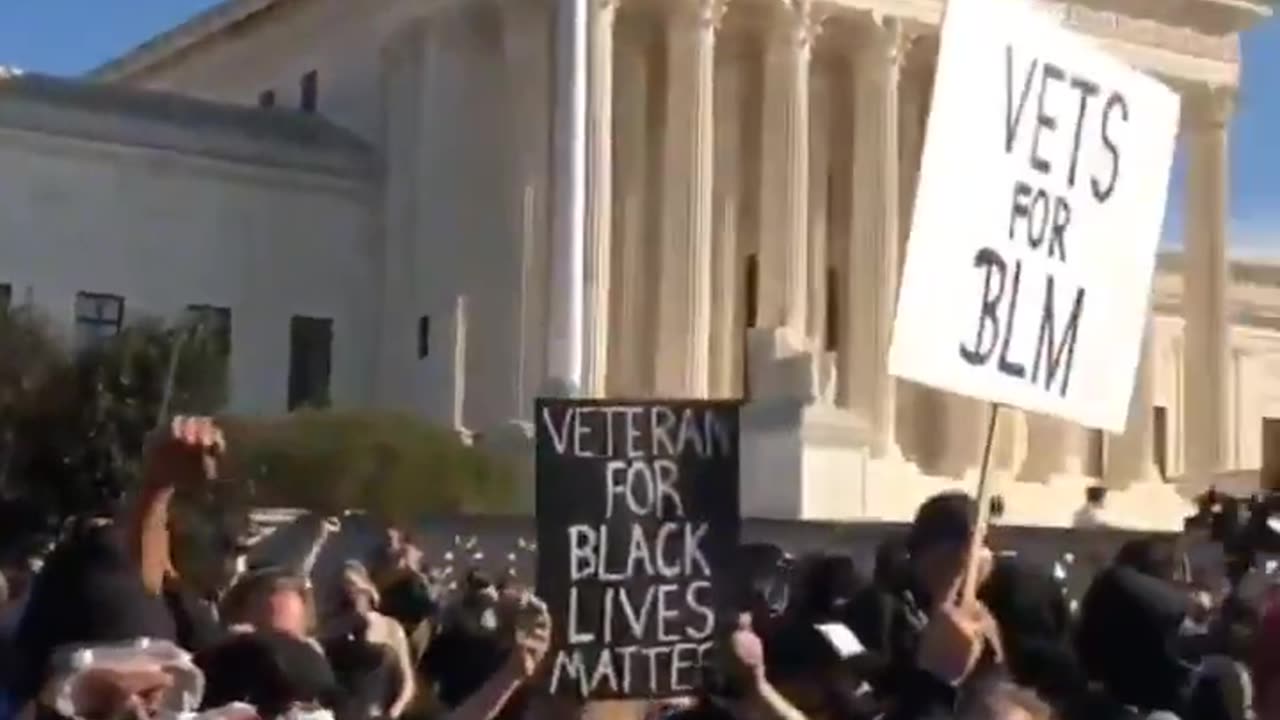 ANTIFA IS A BUDDHIST TERRORIST GROUP: Antifa Thugs Wave Flags with Buddhist Wheel of Dharma Symbol