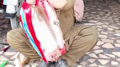 Cleaning motorcycle tank