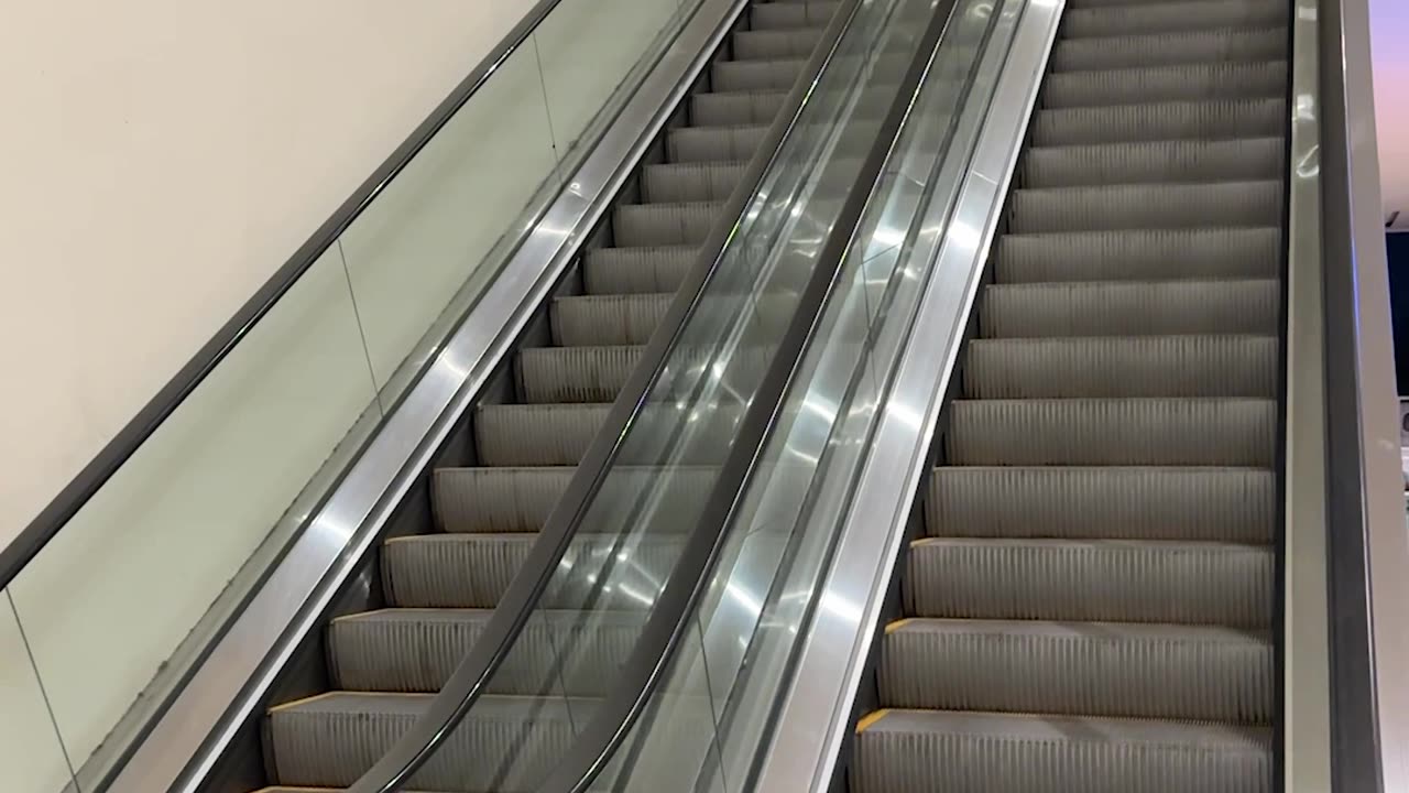 When Liquid Courage Meets a Broken Escalator