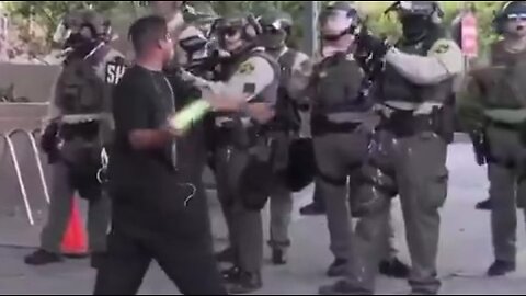 #FAFO 🚨#NEW： Anti-ICE rioter throws a bottle in the face of a Los Angeles Cop REAL▶️ TIME