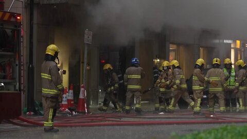 Fire erupts in busy Hong Kong shopping district