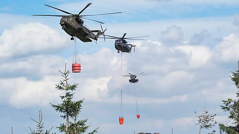 CH-53 Firefighting Helicopters Dropping Water On Wildfire