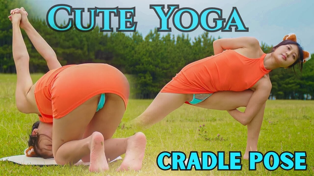 Cute Asian Woman Doing Serene Cradle Pose | Outdoor Yoga for Relaxation 🙏