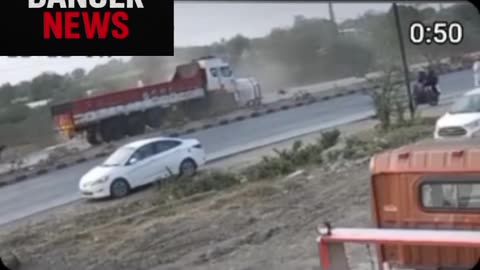 A major accident occurred when the tyre of a moving car burst and the car collided with a truck#new