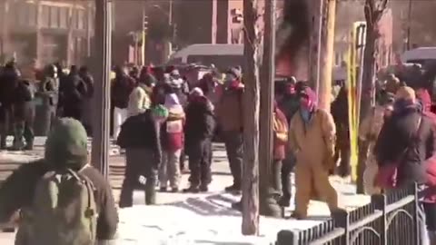 Rioters starting fires in the streets after armed man was shot dead by feds in Minneapolis