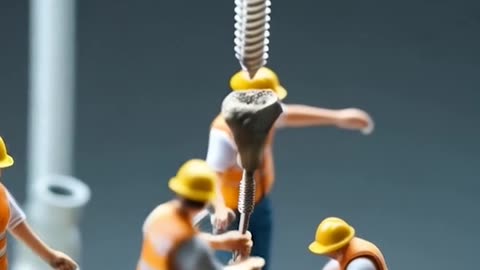 a group of construction workers are working on a shark