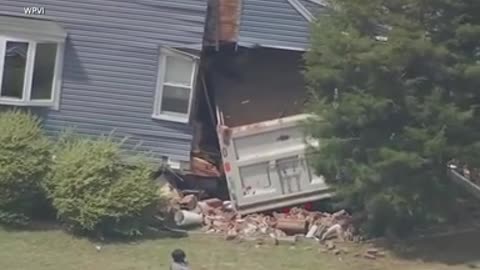 Dump truck plows into New Jersey home after driver suffers medical emergency