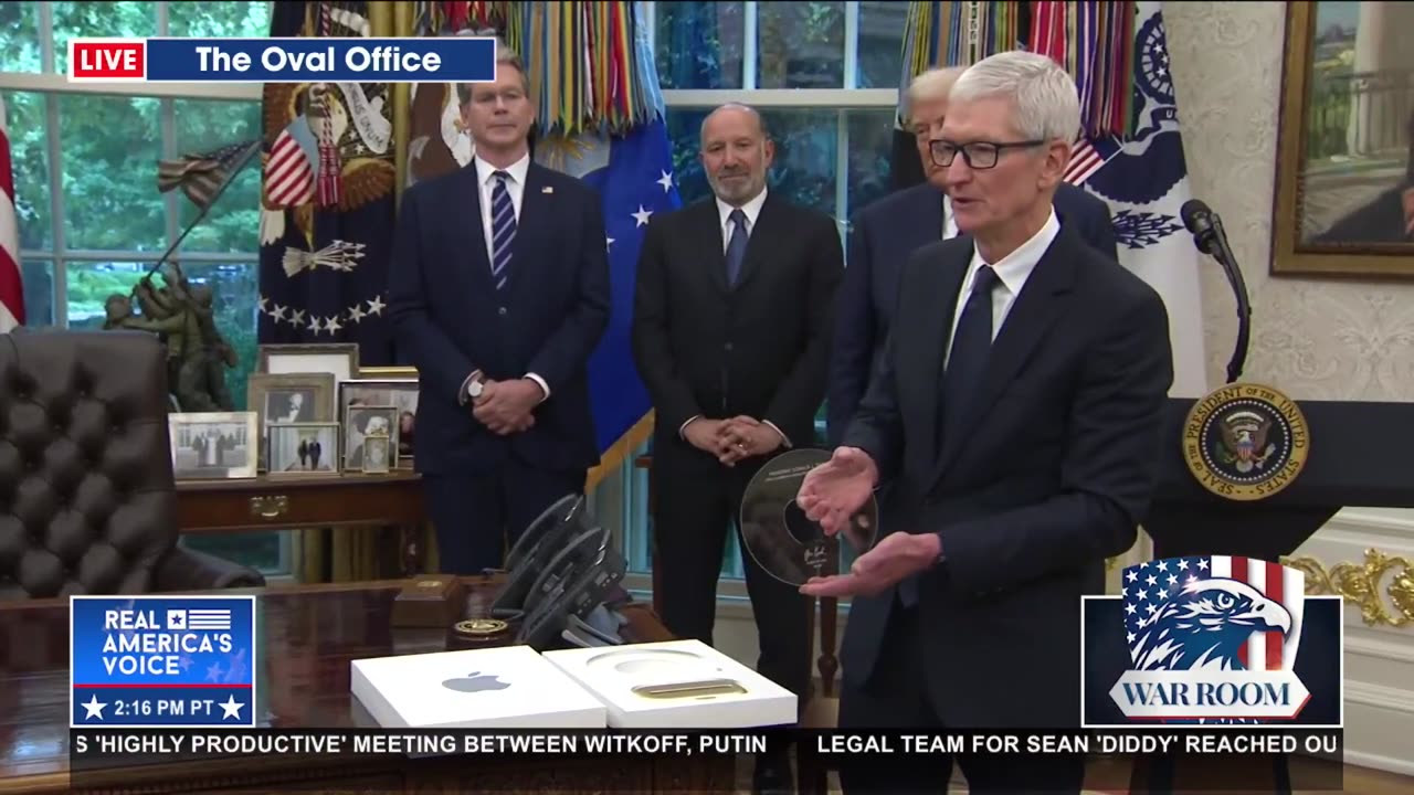 TIM COOK PRESENTS PRESIDENT TRUMP WITH A GIFT