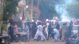 Pakistan police fire tear gas at supporters of ex-PM Khan's party