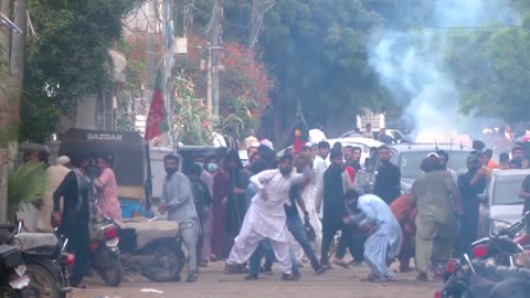 Pakistan police fire tear gas at supporters of ex-PM Khan's party
