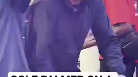 Cole Palmer on a scooter in Times Square