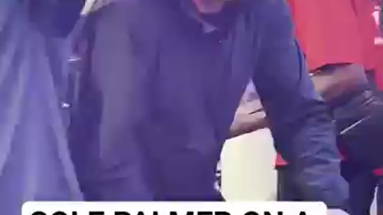 Cole Palmer on a scooter in Times Square