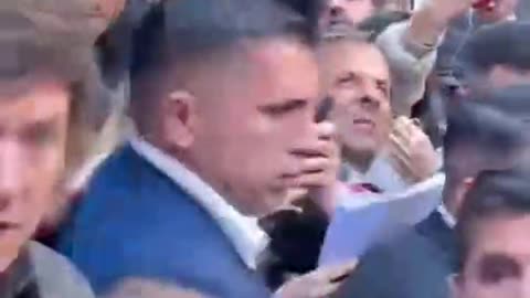Reporter accidentally pushes microphone into President of Argentina Miley's face