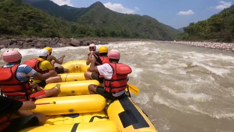 Rapids Send Rafters Into the Drink