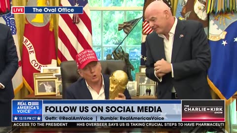 POTUS HOLD FIFA WORLD CUP TROPHY