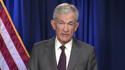 Fed Chair Jerome Powell reacts to his indictment