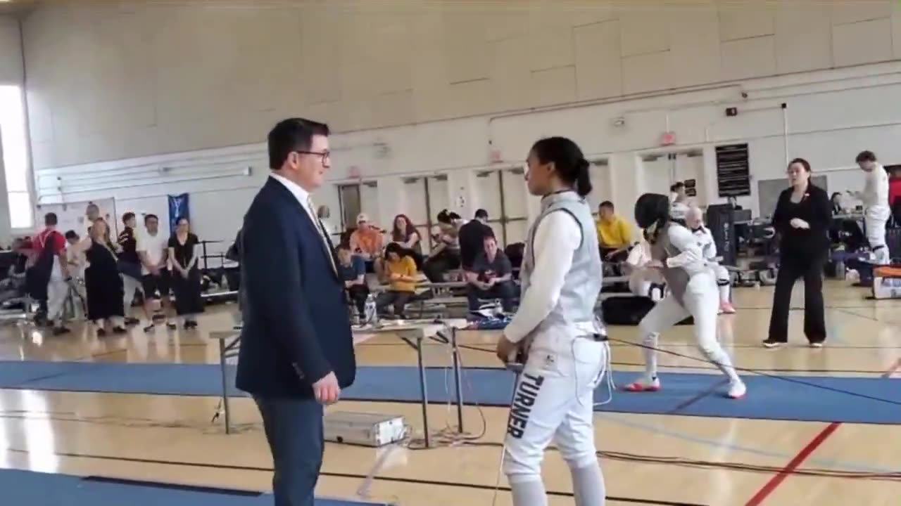 Female Fencer Takes a Knee in Bout Against Male Opponent, Faces Immediate Disqualification