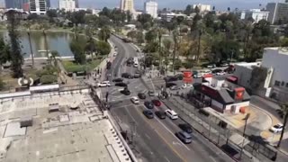 swarms of federal officers roaming a Los Angeles park