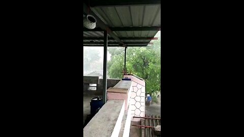 torrential rain in village