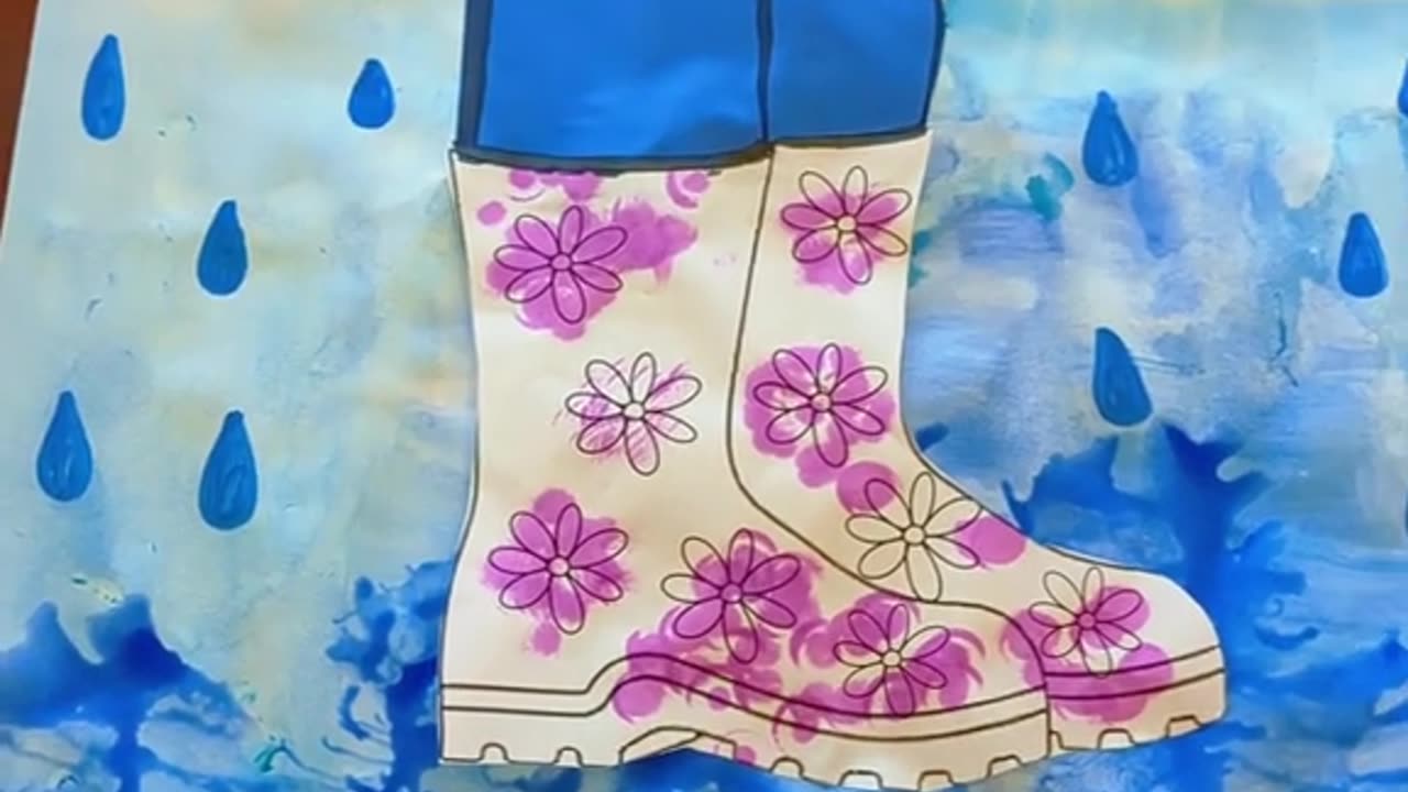 April Rain Boot Craft with our residents from Memory Care painting
